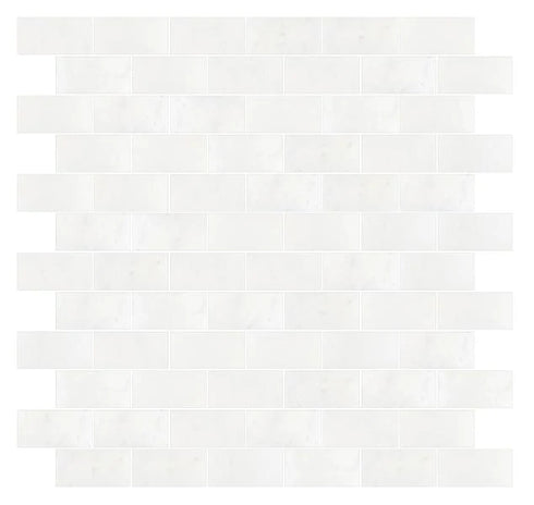 a white tile wall with a white border