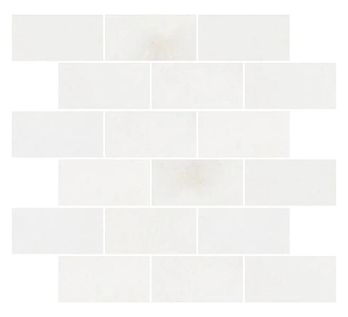 a white tile wall with a white background