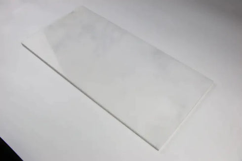 a piece of clear plastic sitting on top of a table