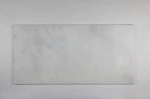 a white square on a white wall in a room