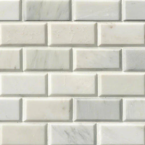 a close up of a white brick wall