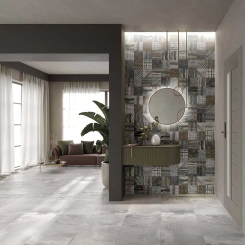 a room with a mirror a couch and a table