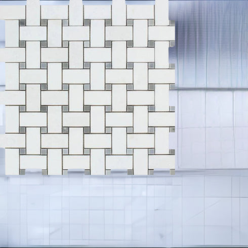 a bathroom with a white tile wall next to a toilet
