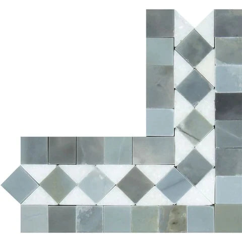 a white and gray mosaic tile wall